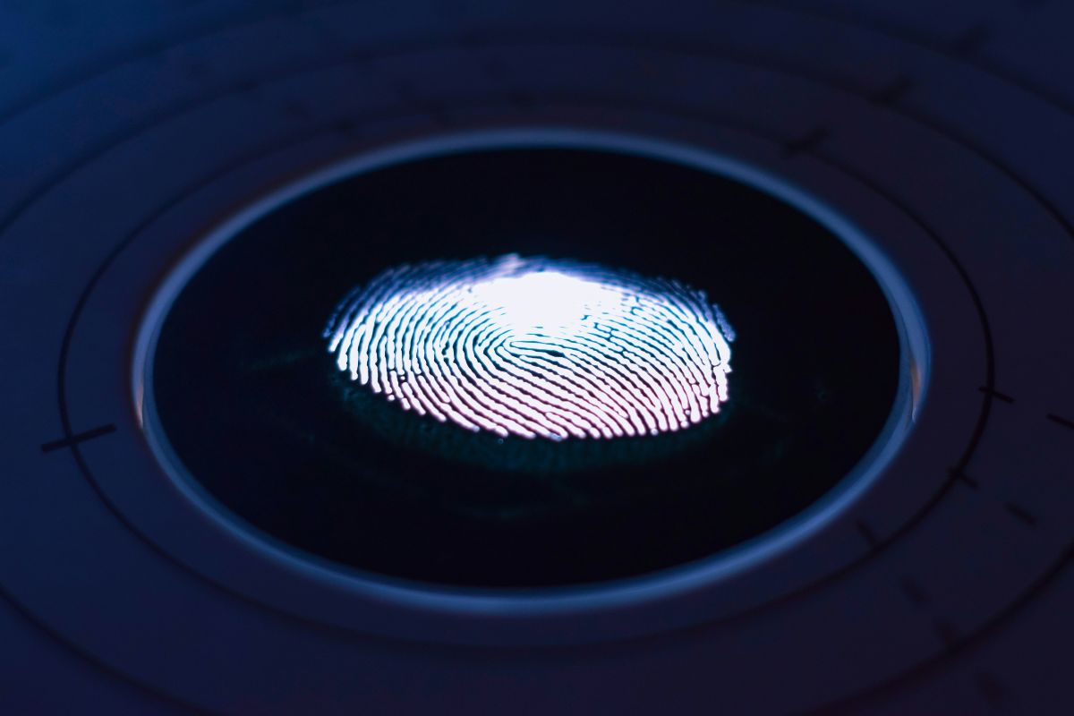 an illuminated fingerprint on a biometric scanner