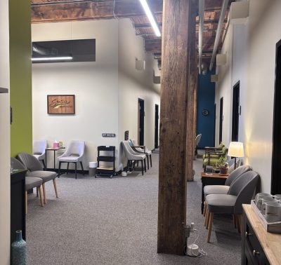 Waiting room at Sentier. Accessible seating for everyone.